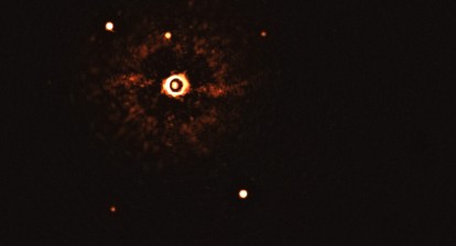 First Ever Image of Exoplanets around a sunlike star. Credit: ESO/Bohn et al.