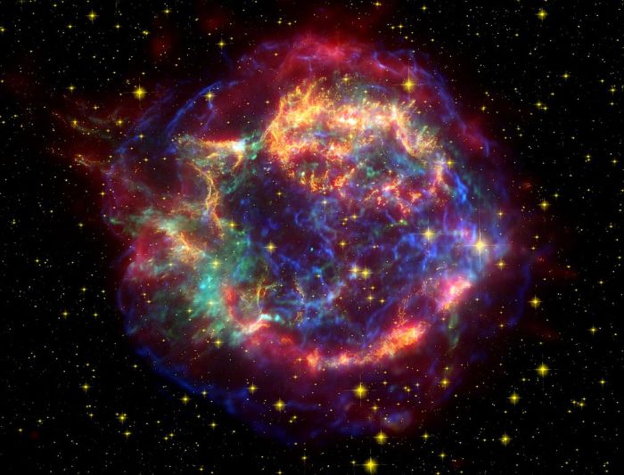 A 2005 composite of Cassiopeia A, combining data from Hubble, Spitzer and Chandra by NASA JPL Caltech