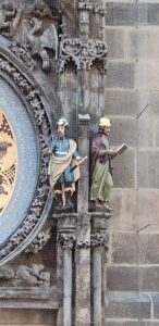 Statuettes on the right side of the calendary dial of the Prague Astronomical Clock. Image: 360onhistory.com