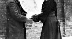 Ruth Belville outside the gates of the Greenwich Observatory, 1908