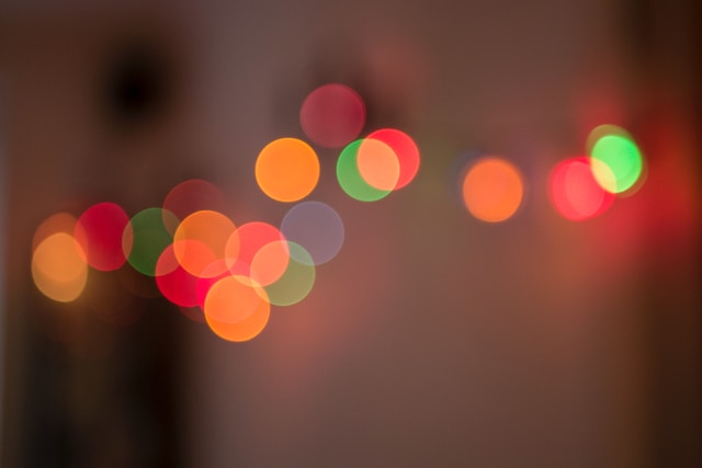 Red, green and orange dots of light