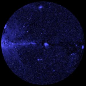 Blue Channel. This image show half of the X-ray sky, projected onto a circle (so-called Zenit Equal Area projection) with the centre of the Milky Way on the left and the galactic plane running horizontally. Photons have been colour-coded according to their energy (red for energies 0.3-0.6 keV, green for 0.6-1 keV, blue for 1-2.3 keV).