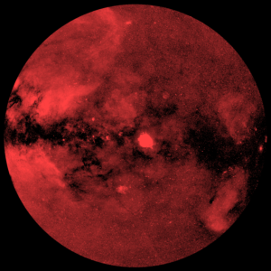 Red Channel. This image show half of the X-ray sky, projected onto a circle (so-called Zenit Equal Area projection) with the centre of the Milky Way on the left and the galactic plane running horizontally. Photons have been colour-coded according to their energy (red for energies 0.3-0.6 keV, green for 0.6-1 keV, blue for 1-2.3 keV). © MPE, J. Sanders for the eROSITA consortium