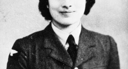 Hon. Assistant Section Officer Noor Inayat Khan (code name Madeleine), George Cross, MiD, Croix de Guerre avec Etoile de Vermeil. Noor Inayat Khan served as a wireless operator with F Section, Special Operations Executive. Black and white image, with Noor smiling, facing the camera, in her unifrom.