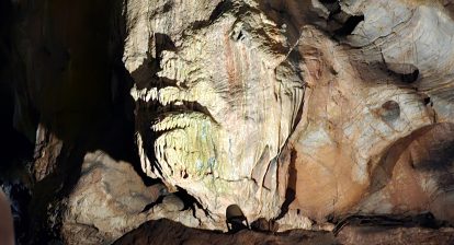 A geological structure inside Kent's Caverns that looks like a scary face.